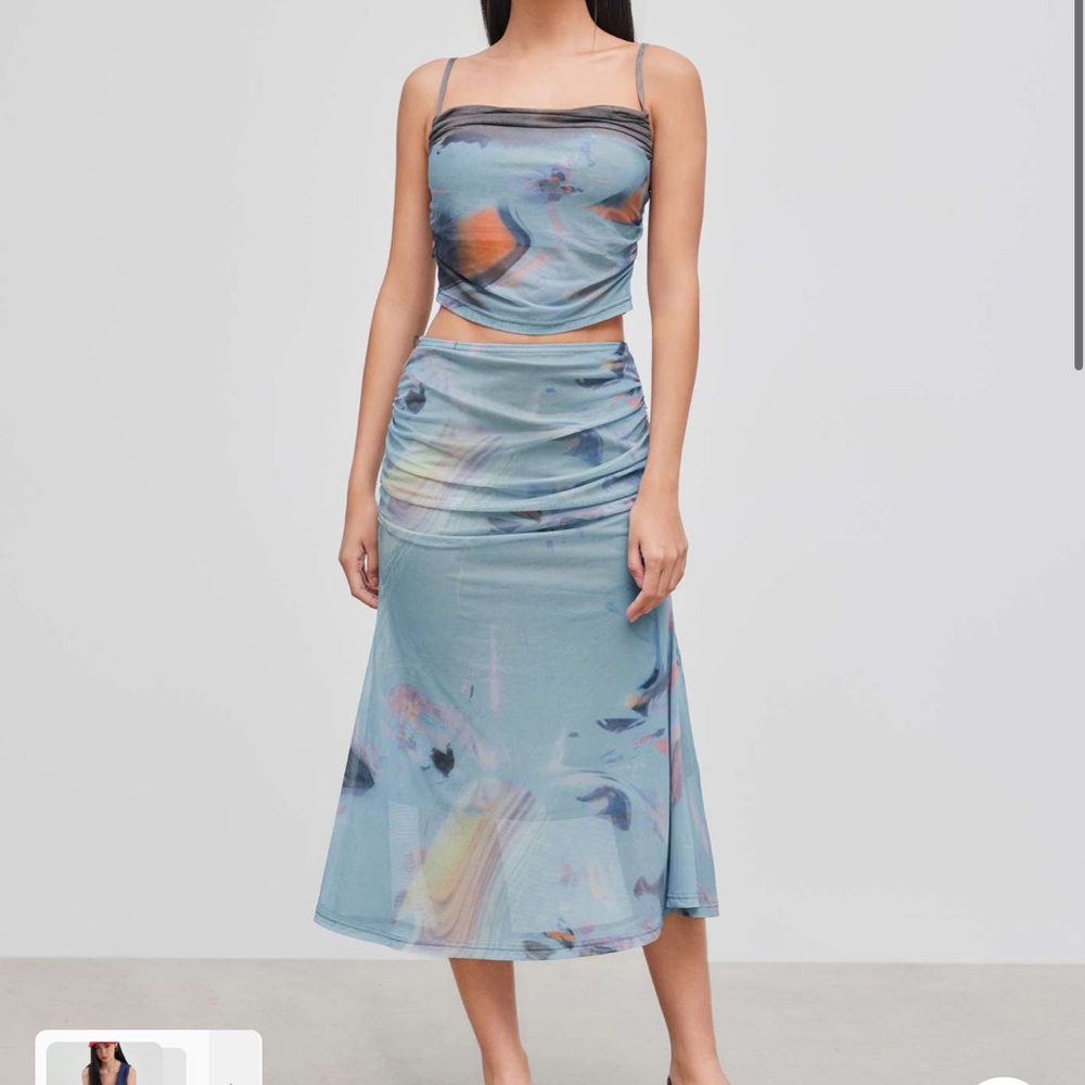 NWT Blue abstract mesh top and skirt set